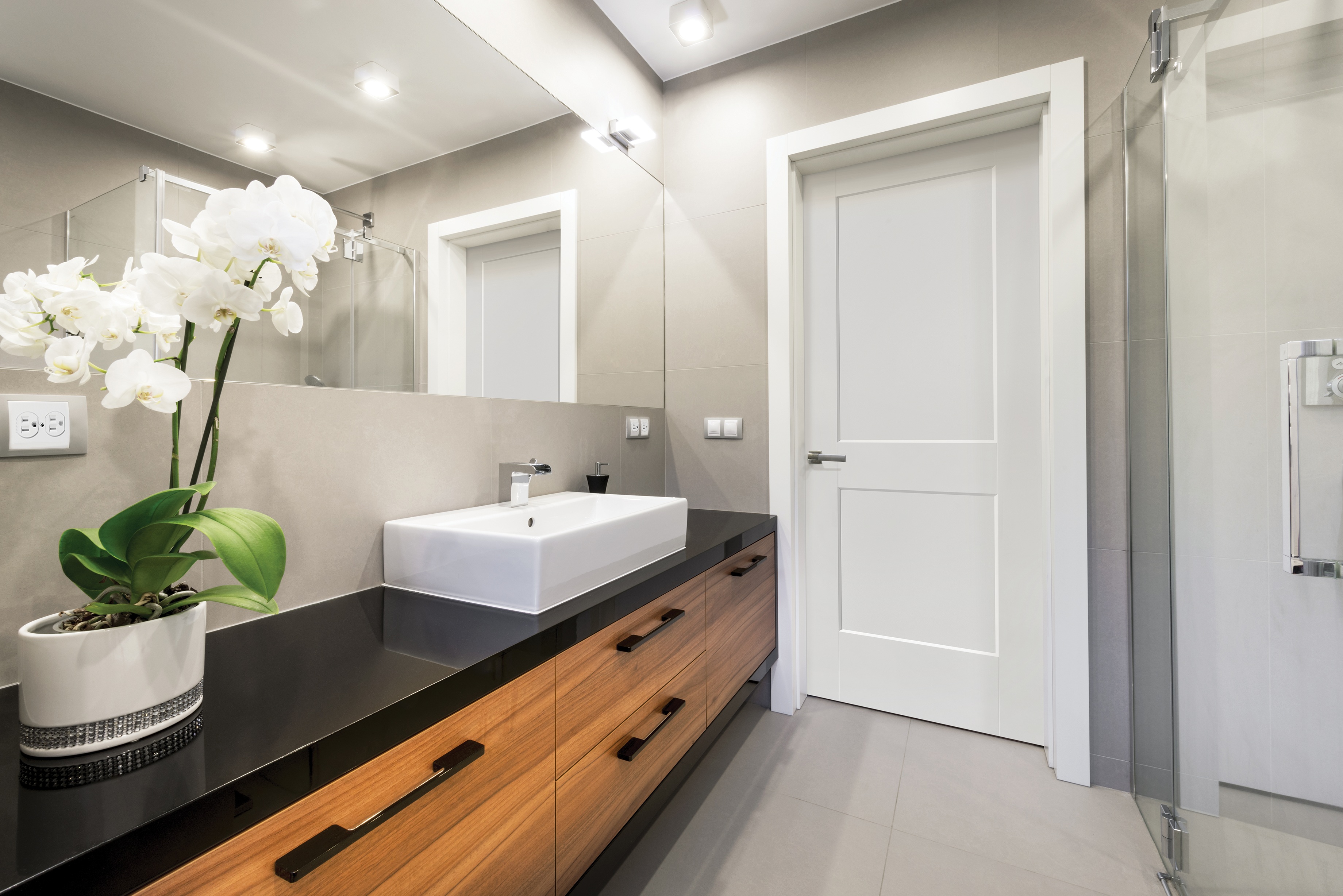 Bainbridge shaker beveled doors in modern bathroom setting