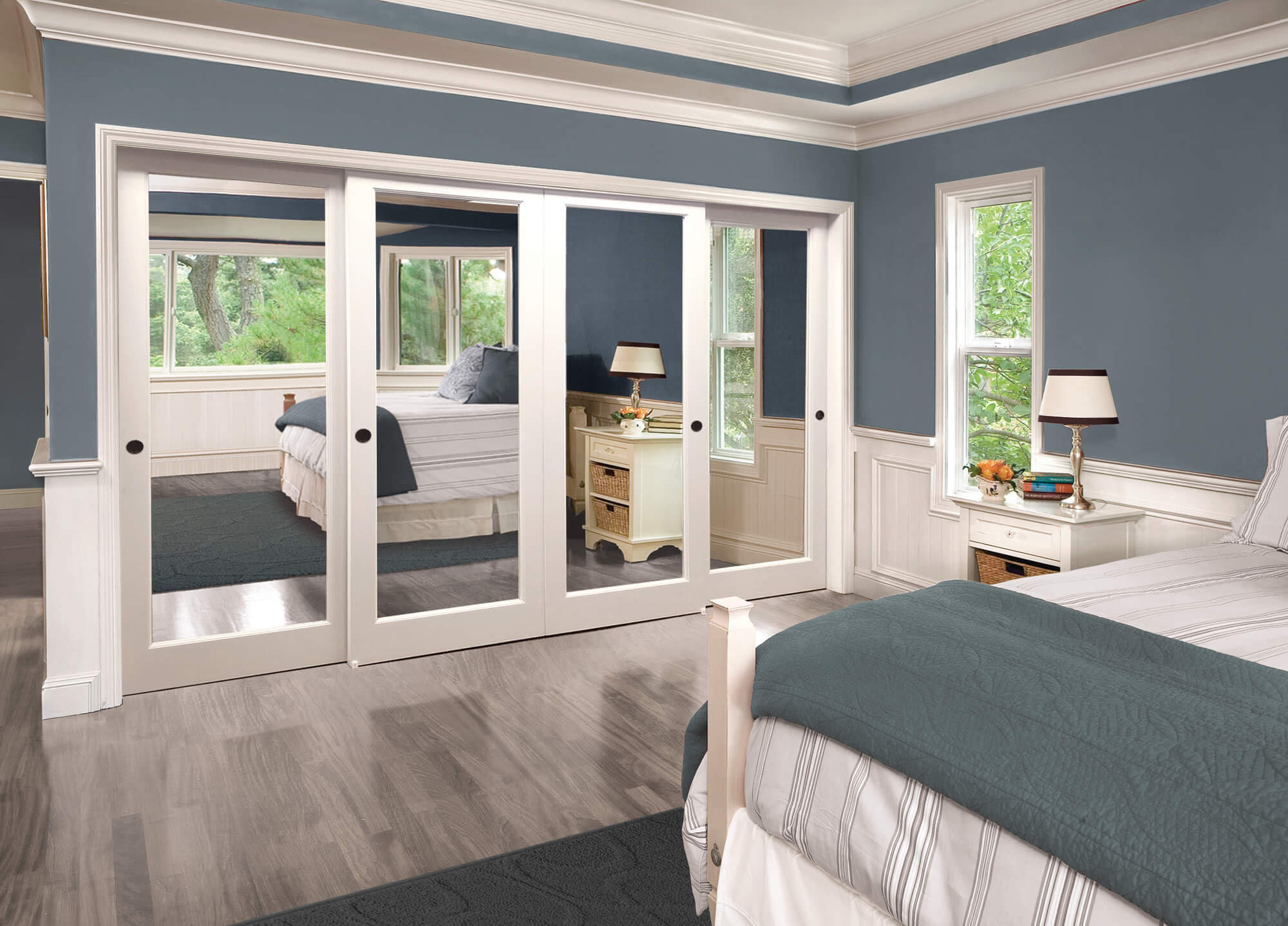 Sliding mirror closet doors in modern bedroom
