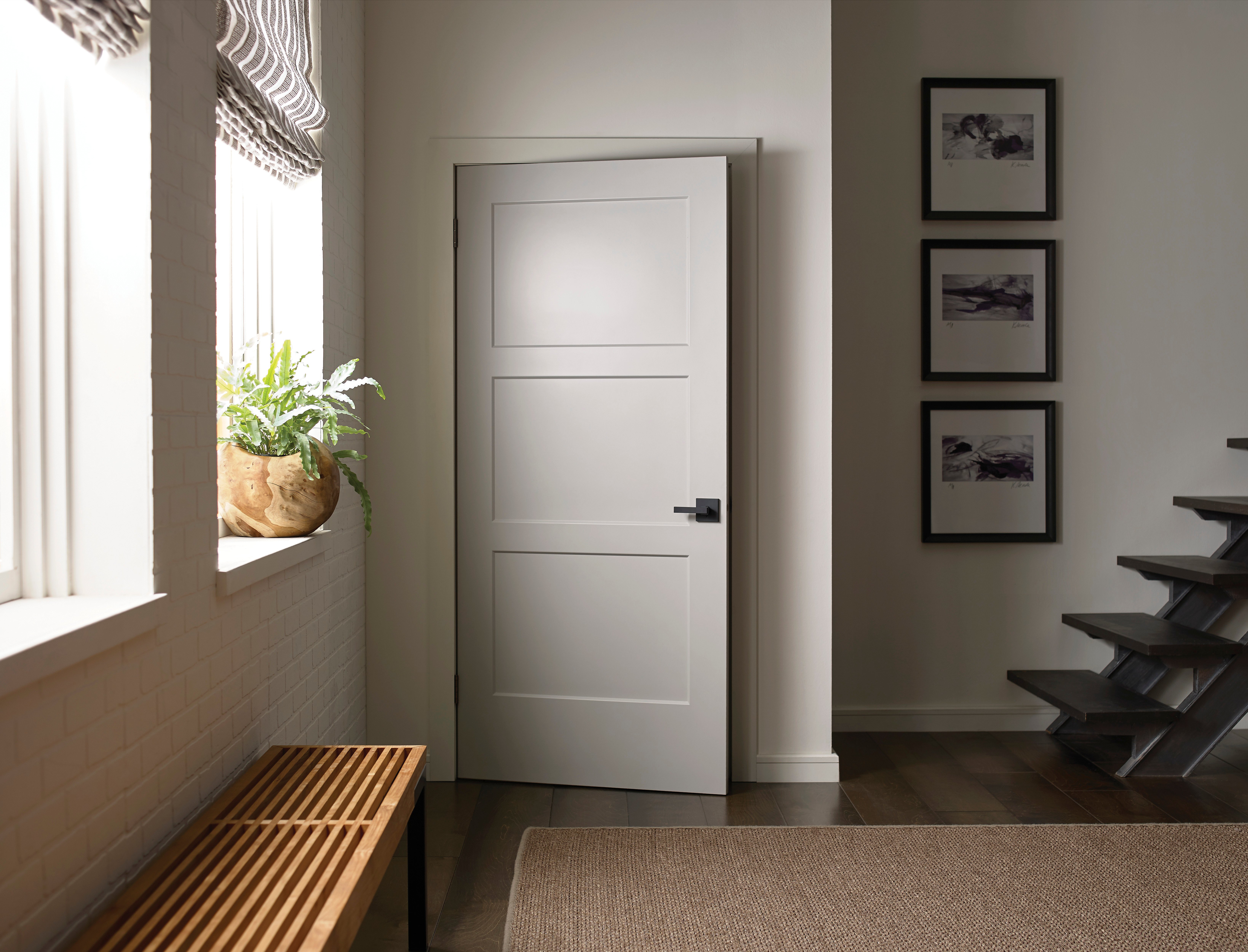 Chelsea shaker beveled doors in elegant hallway